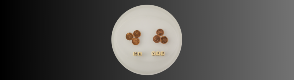 A plate showing fairness two piles of pennies each pile has three with the words you and me